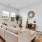 Modern furnishings inside a townhome's living room  at Legacy on Rockhill