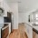 Modern kitchen with stainless steel appliances inside homes at Legacy on Rockhill